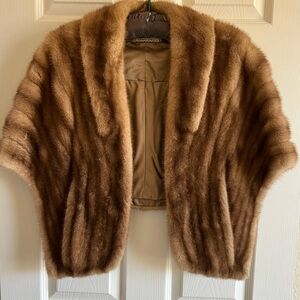 Natural mink stole with pkts from Tron Furs of Paris. Fully lined. Gently used